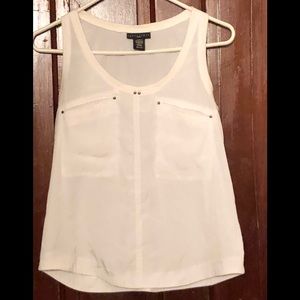 Apostrophe white tank.